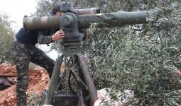 أبو التاو أثناء استهدافه مواقع ميليشيات الأسد في ريف إدلب