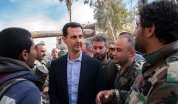 بشار الأسد محاطاً بعدد من ميليشياته في سوريا