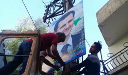 صورة بشار الأسد في مدينة التل