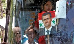 ميركل ورسلان وبشار الأسد