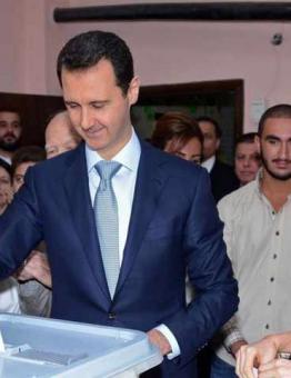 بشار الأسد ينتخب مع زوجته في الانتخابات الرئاسية لعام 2014