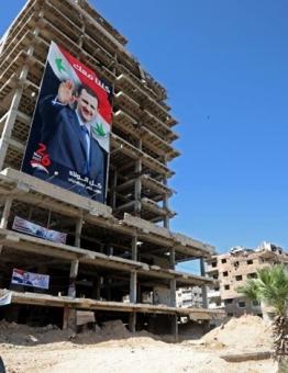 صور بشار الأسد في حمص