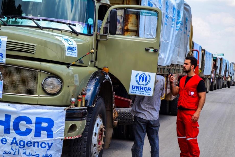 شحنة مساعدات أممية خلال دخولها الأراضي السورية مؤخراً