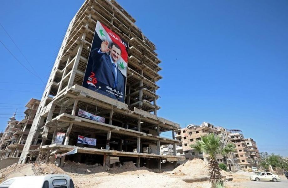 صور بشار الأسد في حمص