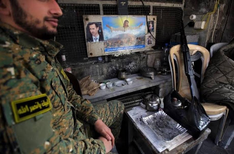 عنصر من ميليشيا حزب الله اللبناني في حلب
